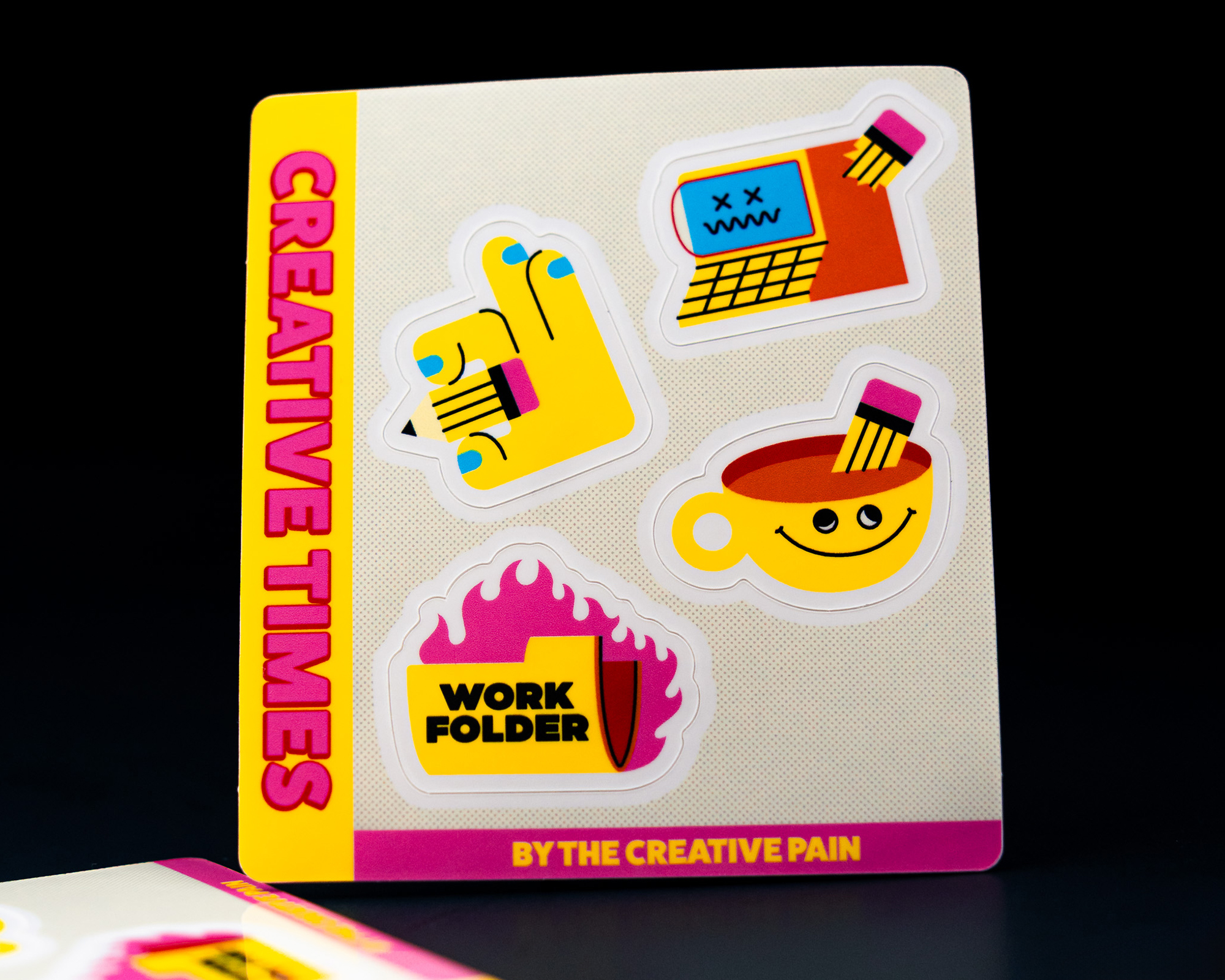 Sticker sheet titled "Creative Times" with colorful graphics: a finger tap, burning folder, grinning coffee cup, and computer.